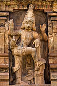 The great Chola temples of Tamil Nadu - The Brihadishwara Temple of Thanjavur. Outsized guardian figure of the second (inner) entrance gopura. 